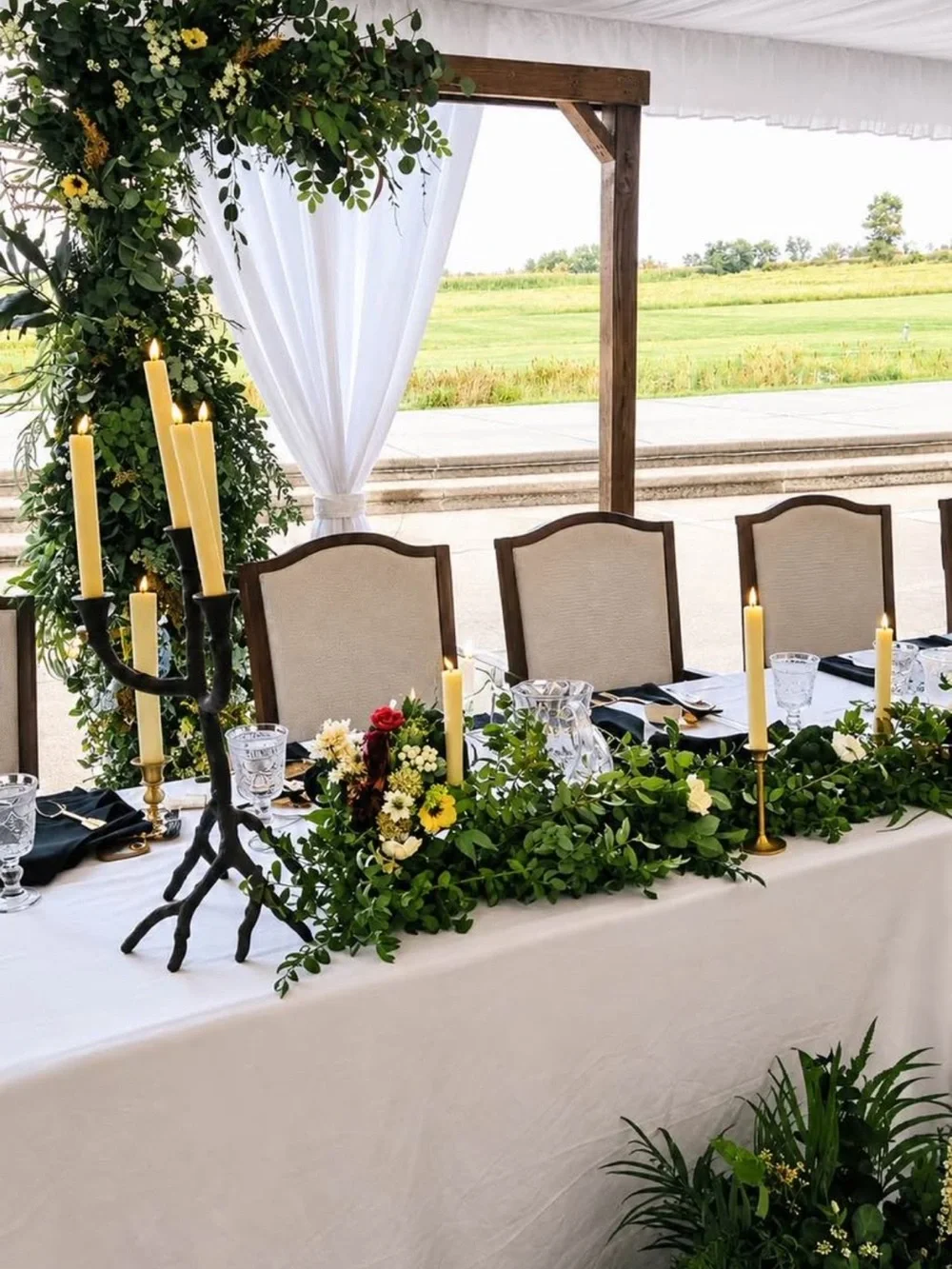 Wedding Floral Arch and Floral Floor Accents